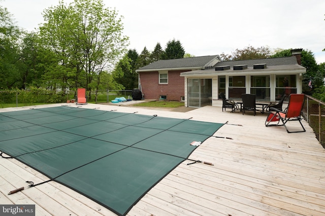 1581 W Branch Rd, State College, PA 16801 - view of swimming pool featuring a deck and a sunroom