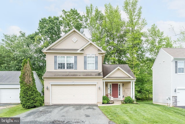85 Ridge Run Road, North East, MD 21901 - traditional home featuring asphalt driveway, a front lawn, a garage, and a porch