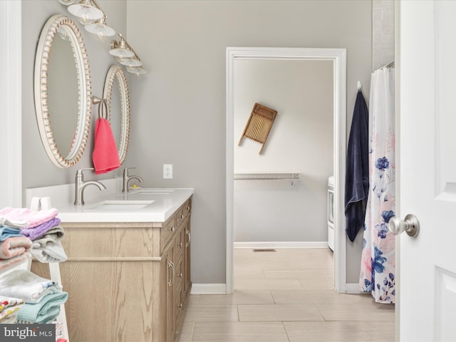 215 S Virginia St, Strasburg, VA 22657 - bathroom featuring vanity and baseboards
