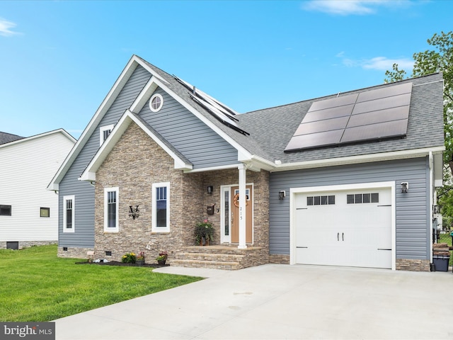 215 S Virginia St, Strasburg, VA 22657 - view of front of home featuring solar panels, stone siding, a garage, concrete driveway, and a front lawn