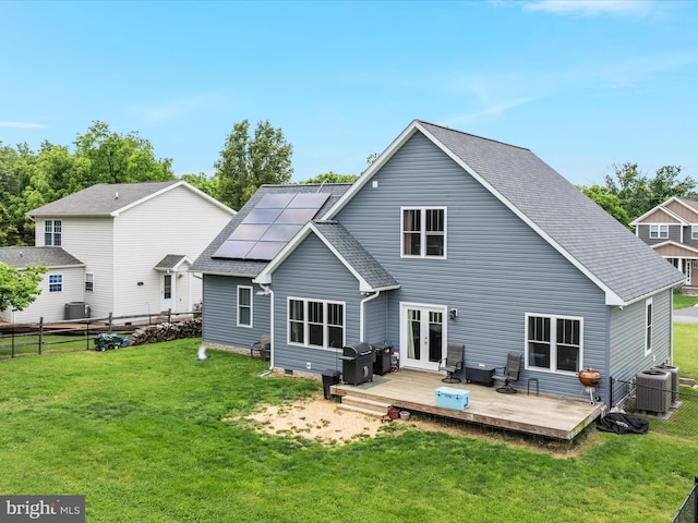 215 S Virginia St, Strasburg, VA 22657 - back of house featuring french doors, a deck, central AC unit, and roof mounted solar panels