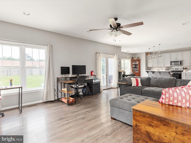 215 S Virginia St, Strasburg, VA 22657 - living room featuring a desk, a ceiling fan, light wood finished floors, recessed lighting, and baseboards