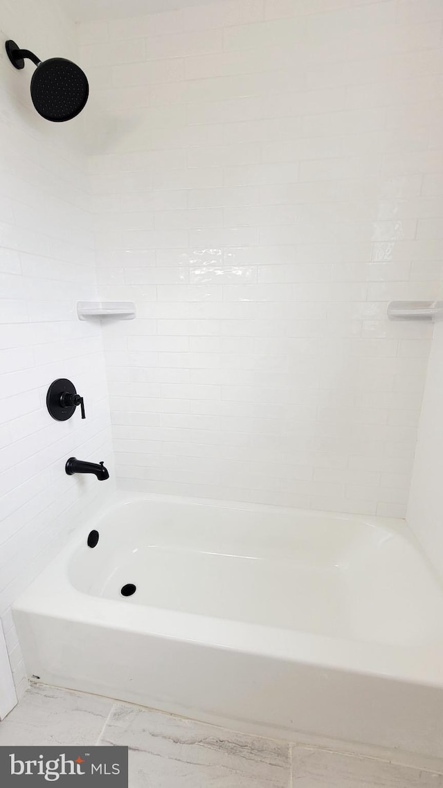 139 Wilmington Pl SE, Washington, DC 20032 - bathroom with shower / washtub combination and marble finish flooring