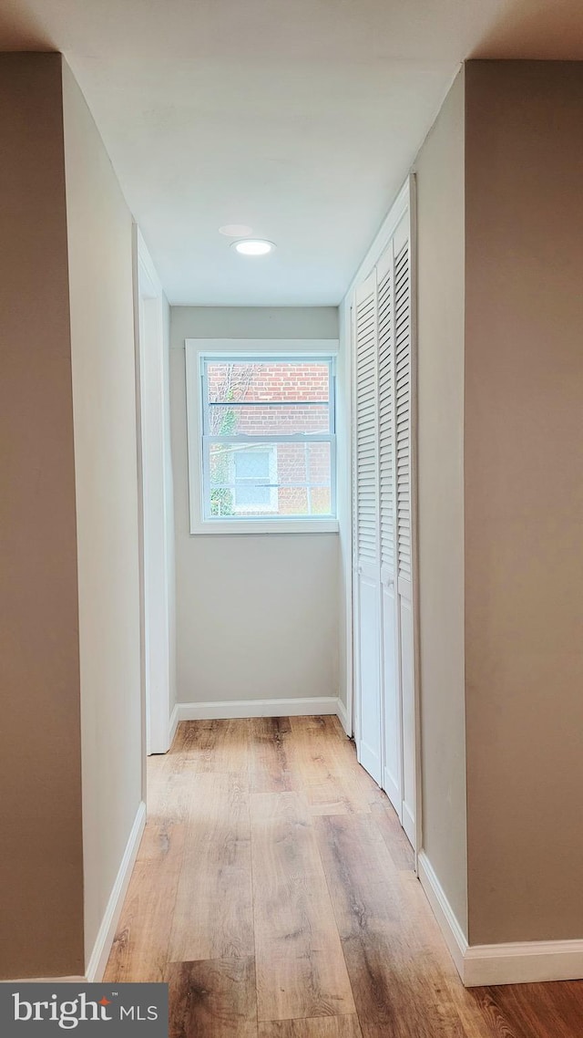 139 Wilmington Pl SE, Washington, DC 20032 - hallway featuring wood finished floors and baseboards