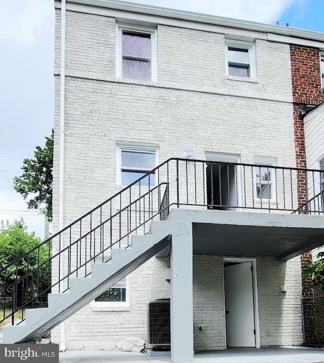 139 Wilmington Pl SE, Washington, DC 20032 - back of property featuring stairs and brick siding