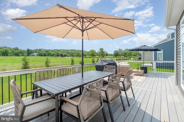 220 Moorefield St, Mechanicsburg, PA 17055 - deck with outdoor dining space, a lawn, and view of scattered trees