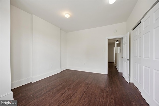 5324 Cedar Ave, Philadelphia, PA 19143 - unfurnished bedroom featuring dark wood-style floors and baseboards