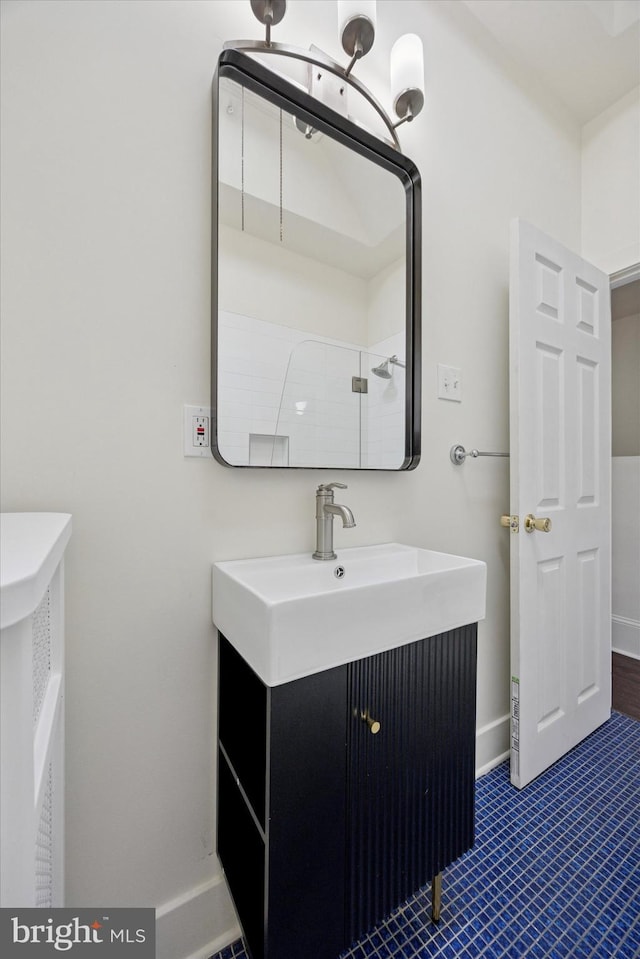 5324 Cedar Ave, Philadelphia, PA 19143 - full bathroom featuring vanity, baseboards, and tile patterned floors