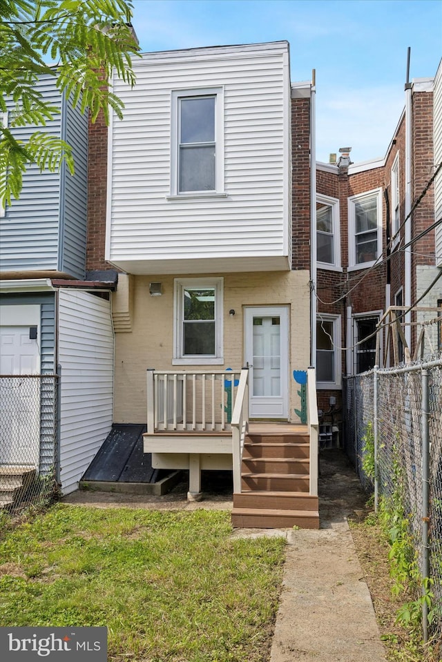5324 Cedar Ave, Philadelphia, PA 19143 - multi unit property with a wooden deck and brick siding