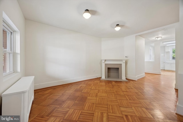 5324 Cedar Ave, Philadelphia, PA 19143 - unfurnished living room featuring baseboards and a fireplace