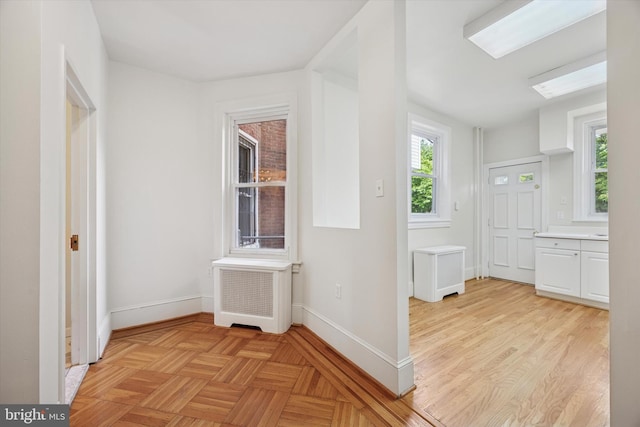 5324 Cedar Ave, Philadelphia, PA 19143 - corridor featuring radiator and baseboards