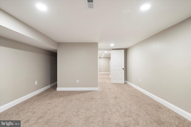 1202 Dukeland St, Baltimore, MD 21216 - finished below grade area with recessed lighting, light carpet, and baseboards