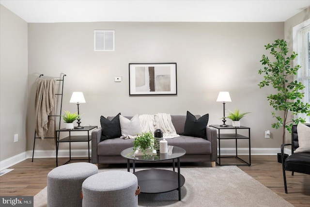 1202 Dukeland St, Baltimore, MD 21216 - living area with wood finished floors and baseboards