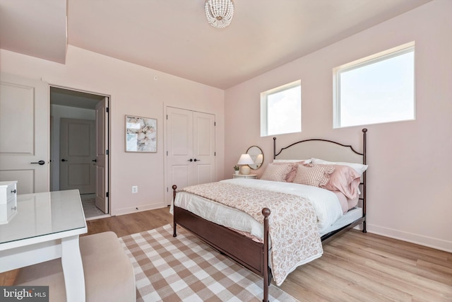 714 Iron Frg Unit A, Frederick, MD 21702 - bedroom featuring light wood-type flooring, baseboards, and a closet