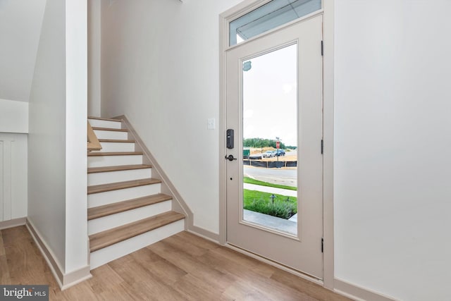 714 Iron Frg Unit A, Frederick, MD 21702 - foyer entrance with light wood-style flooring, stairway, and baseboards