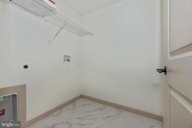 714 Iron Frg Unit A, Frederick, MD 21702 - washroom with hookup for a washing machine, baseboards, electric dryer hookup, and marble look tile flooring
