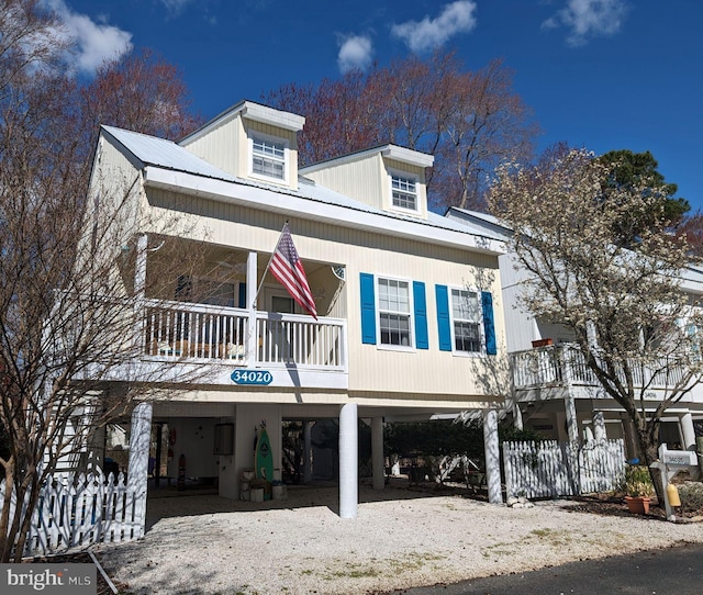 34020 Cypress Ln Unit 136, Frankford, DE 19945 - raised beach house featuring a carport and driveway