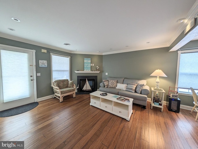 34020 Cypress Ln Unit 136, Frankford, DE 19945 - living area featuring a fireplace with flush hearth, healthy amount of natural light, dark wood finished floors, ornamental molding, and recessed lighting