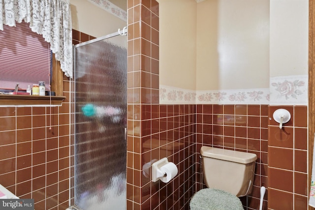 2453 Lincoln Hwy E, Lancaster, PA 17602 - bathroom with a stall shower, a wainscoted wall, tile walls, and toilet