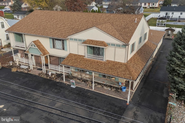 2453 Lincoln Hwy E, Lancaster, PA 17602 - rear view of property with roof with shingles and a residential view