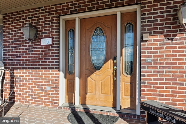 2453 Lincoln Hwy E, Lancaster, PA 17602 - doorway to property featuring brick siding and a porch