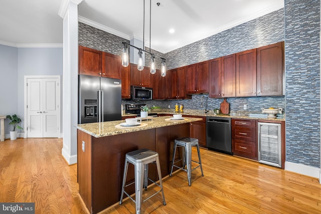 2772 Lighthouse Pt E Unit 101, Baltimore, MD 21224 - kitchen with high end refrigerator, black dishwasher, beverage cooler, ornamental molding, and light wood finished floors