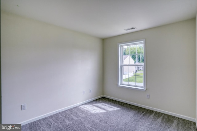 217 Tea Party Trl, Dover, DE 19901 - spare room with baseboards and carpet flooring