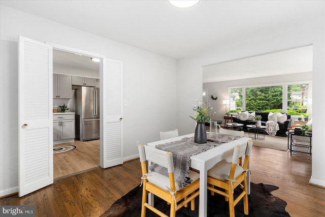 8511 Valleyfield Rd, Lutherville Timonium, MD 21093 - dining room with dark wood-type flooring and baseboards