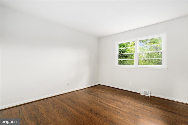 8511 Valleyfield Rd, Lutherville Timonium, MD 21093 - unfurnished room with baseboards and dark wood-style floors