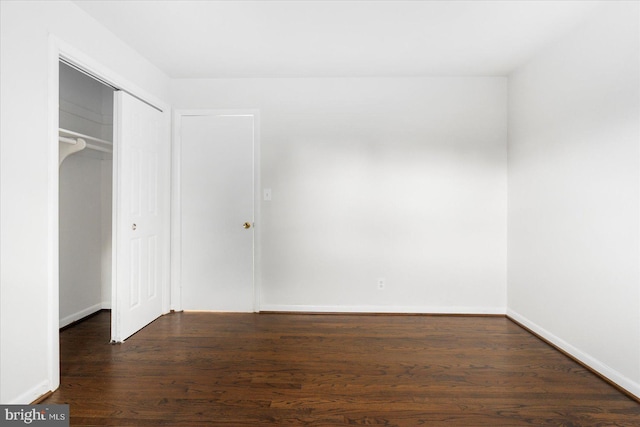 8511 Valleyfield Rd, Lutherville Timonium, MD 21093 - unfurnished bedroom featuring dark wood-type flooring, a closet, and baseboards
