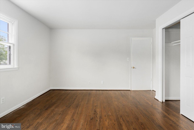 8511 Valleyfield Rd, Lutherville Timonium, MD 21093 - unfurnished bedroom with wood finished floors, baseboards, and a closet