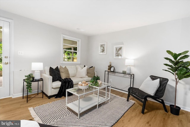 8511 Valleyfield Rd, Lutherville Timonium, MD 21093 - living area with light wood-style flooring and baseboards