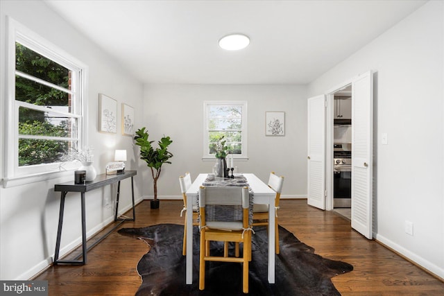 8511 Valleyfield Rd, Lutherville Timonium, MD 21093 - dining area with dark wood-style flooring and baseboards