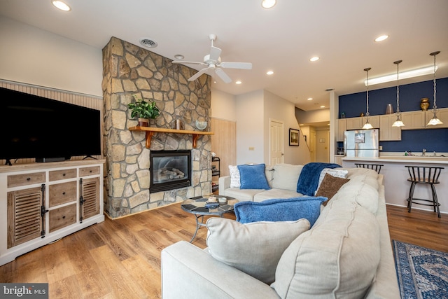 1278 Deep Creek Dr Unit B3, Mc Henry, MD 21541 - living area with ceiling fan, a stone fireplace, wood finished floors, and recessed lighting
