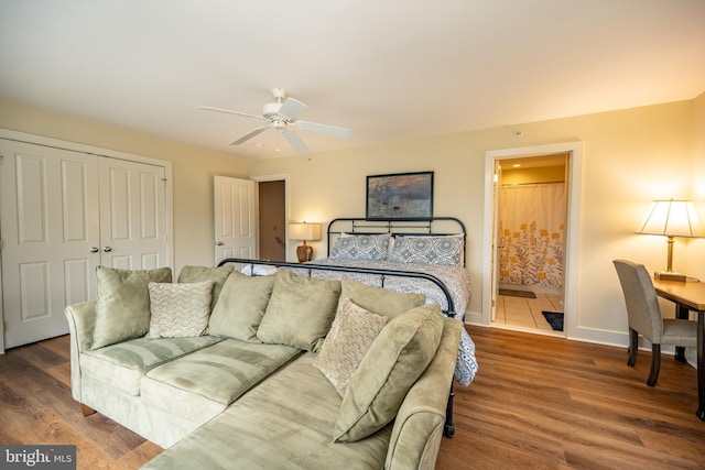 1278 Deep Creek Dr Unit B3, Mc Henry, MD 21541 - bedroom featuring a closet, wood finished floors, baseboards, ceiling fan, and ensuite bathroom