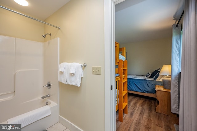 1278 Deep Creek Dr Unit B3, Mc Henry, MD 21541 - ensuite bathroom featuring shower / tub combination and wood finished floors