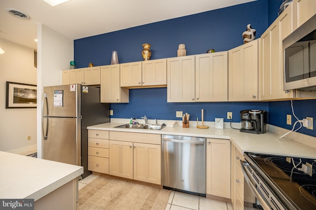 1278 Deep Creek Dr Unit B3, Mc Henry, MD 21541 - kitchen featuring stainless steel appliances, a sink, light countertops, and light tile patterned floors