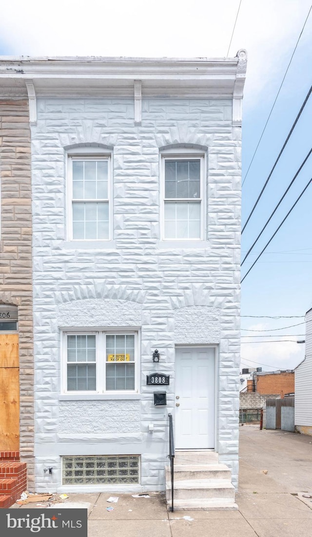 3808 Mount Pleasant Ave, Baltimore, MD 21224 - view of property featuring stone siding and entry steps