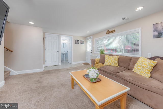 734 Shields, West Deptford, NJ 08096 - living room with recessed lighting, baseboards, stairway, light colored carpet, and light tile patterned flooring