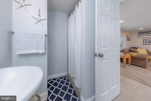 734 Shields, West Deptford, NJ 08096 - ensuite bathroom with tile patterned flooring, baseboards, a sink, and curtained shower