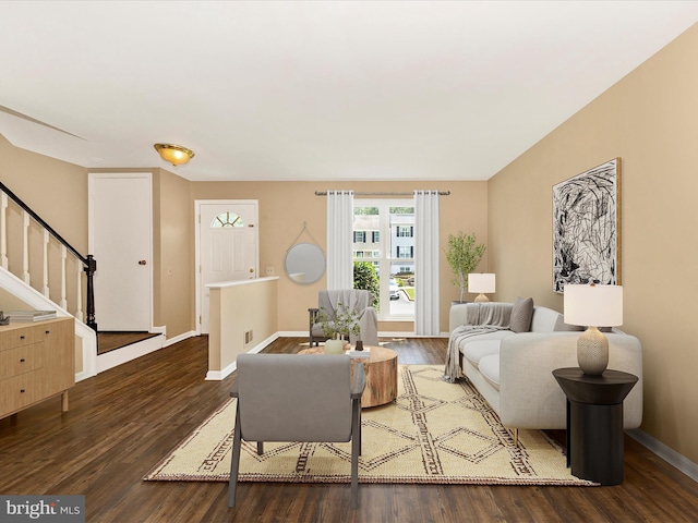 1851 Dulaney Ct, Frederick, MD 21702 - living room featuring wood finished floors, stairway, and baseboards