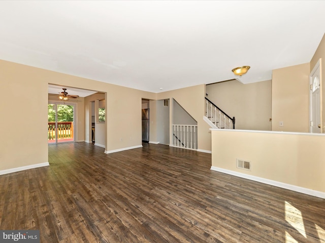 1851 Dulaney Ct, Frederick, MD 21702 - unfurnished living room featuring wood finished floors, baseboards, ceiling fan, and stairs