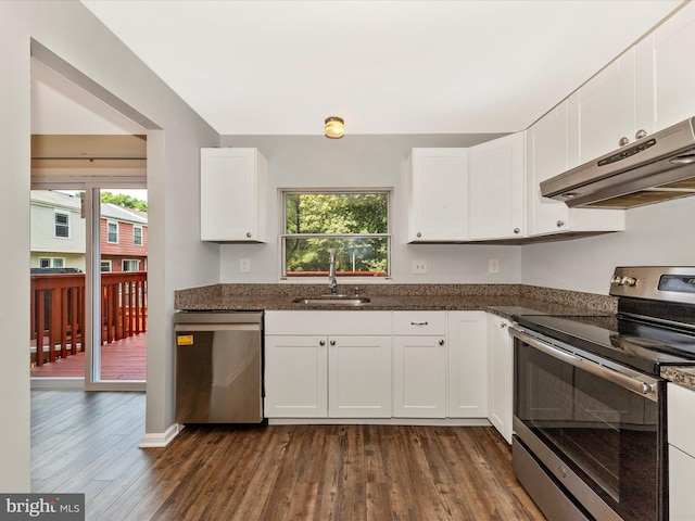 1851 Dulaney Ct, Frederick, MD 21702 - kitchen with appliances with stainless steel finishes, under cabinet range hood, a sink, dark wood-type flooring, and healthy amount of natural light