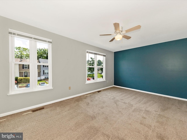 1851 Dulaney Ct, Frederick, MD 21702 - carpeted spare room featuring baseboards and a ceiling fan