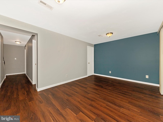 1851 Dulaney Ct, Frederick, MD 21702 - spare room featuring dark wood-style flooring and baseboards
