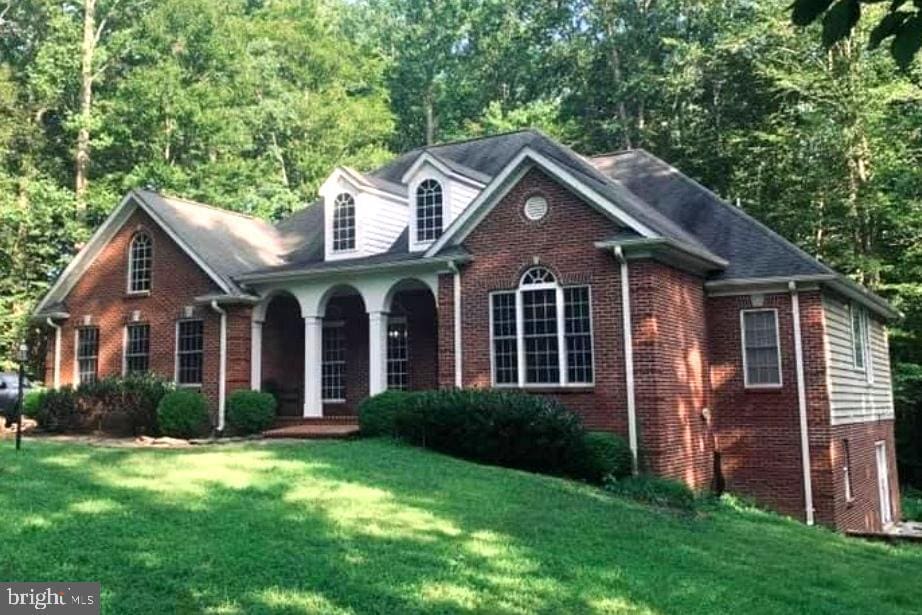 15650 Cloverleaf Ct, Hughesville, MD 20637 - view of front of property with brick siding and a front lawn