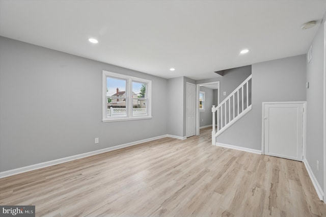 732 Thorndale Rd, Aldan, PA 19018 - unfurnished living room with wood finished floors, stairway, baseboards, and recessed lighting
