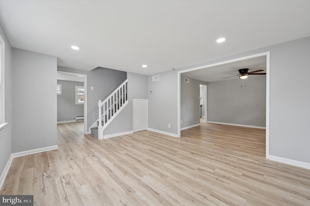 732 Thorndale Rd, Aldan, PA 19018 - unfurnished room with a baseboard heating unit, ceiling fan, stairway, light wood-style flooring, and recessed lighting
