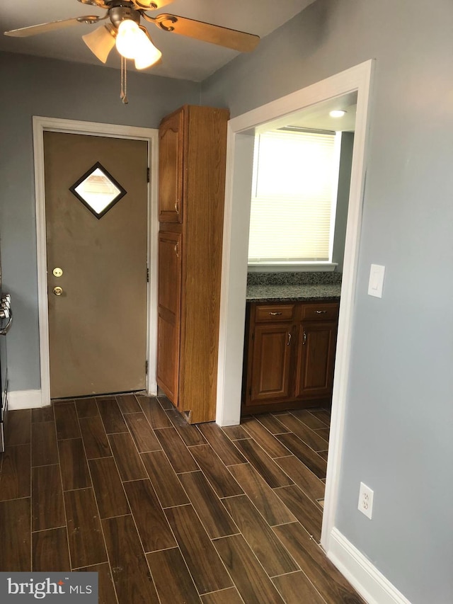 3149 Willits Rd, Philadelphia, PA 19114 - foyer with wood tiled floors, a ceiling fan, and baseboards