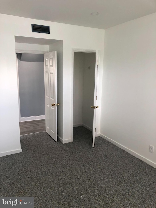 3149 Willits Rd, Philadelphia, PA 19114 - unfurnished bedroom featuring dark colored carpet and baseboards